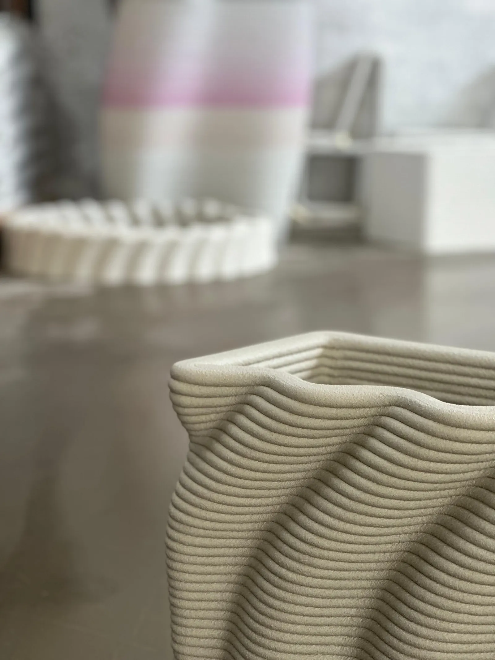 Close-up of printed concrete layers with a wave texture
