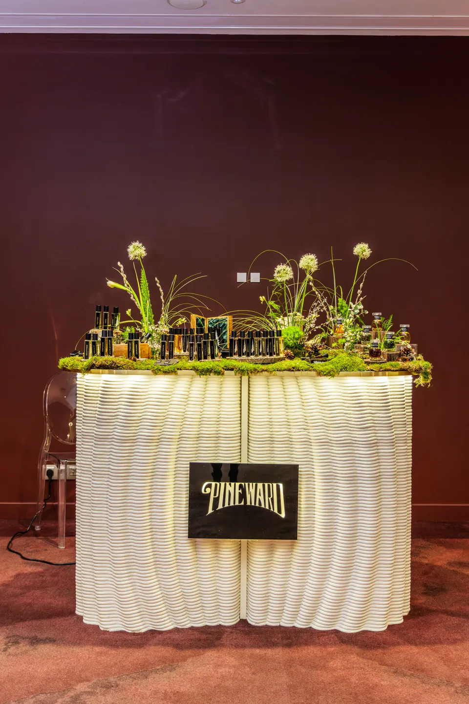 Printed desk dressed with moss and grasses