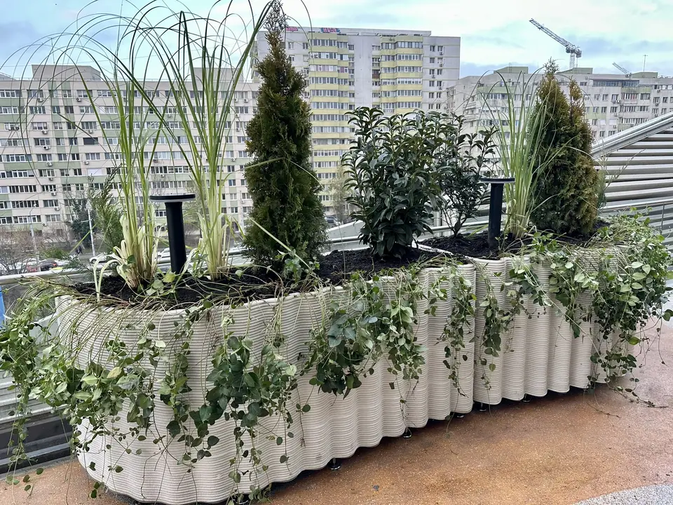 Long ribbed planter along the terrace edge