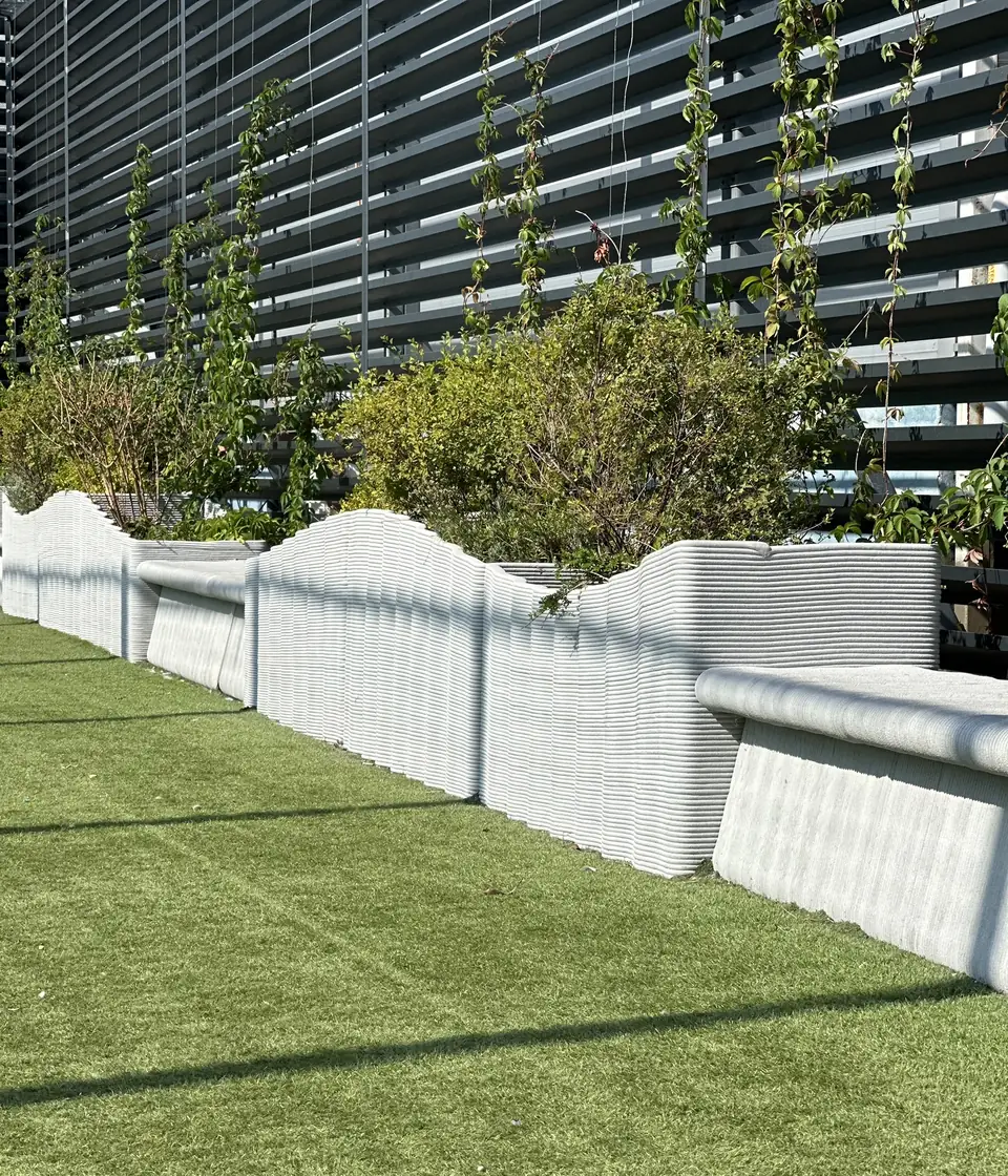 Rippled planter with an integrated bench
