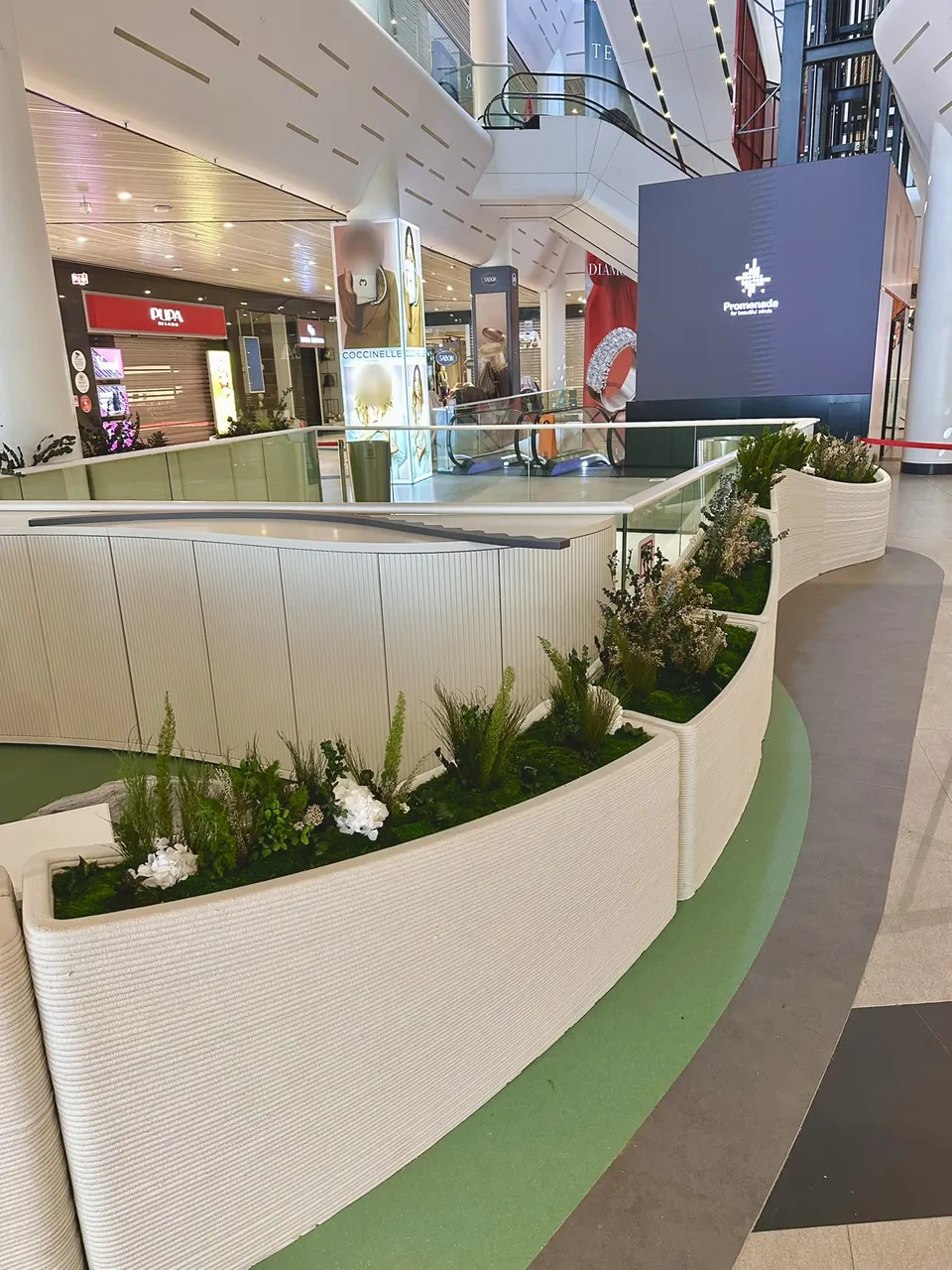 Info desk, sofas and planters, Promenada Mall, Bucharest